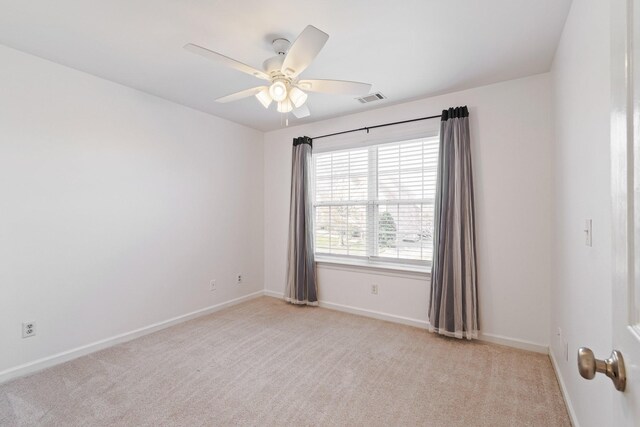 1505 Charleston Park Dr, Spring Hill, TN 37174 - spare room featuring light carpet, ceiling fan, and baseboards