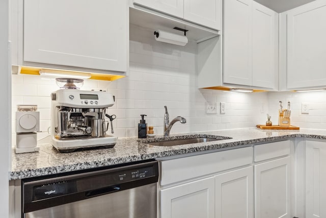105 Grayson Cir, Chapel Hill, TN 37034 - kitchen featuring dishwasher, tasteful backsplash, a sink, and white cabinetry