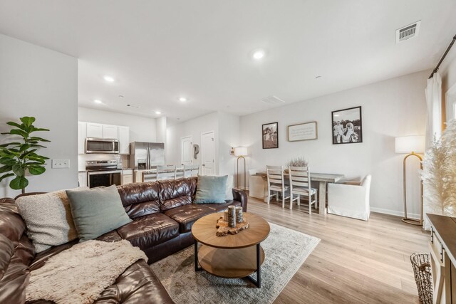 105 Grayson Cir, Chapel Hill, TN 37034 - living room with light wood-style floors, recessed lighting, and baseboards