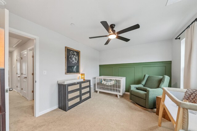 105 Grayson Cir, Chapel Hill, TN 37034 - bedroom featuring attic access, light colored carpet, a crib, ceiling fan, and wainscoting