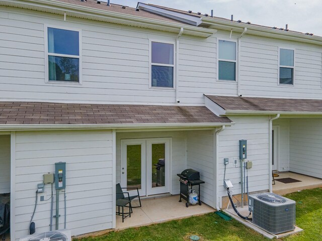 105 Grayson Cir, Chapel Hill, TN 37034 - back of house with cooling unit and a patio