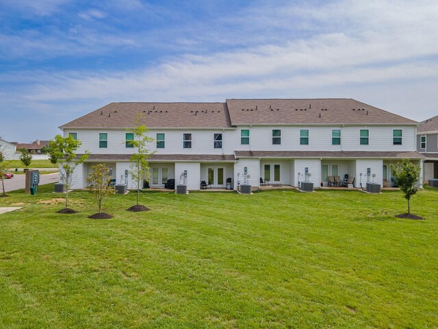 105 Grayson Cir, Chapel Hill, TN 37034 - rear view of house with french doors, central AC unit, and a lawn