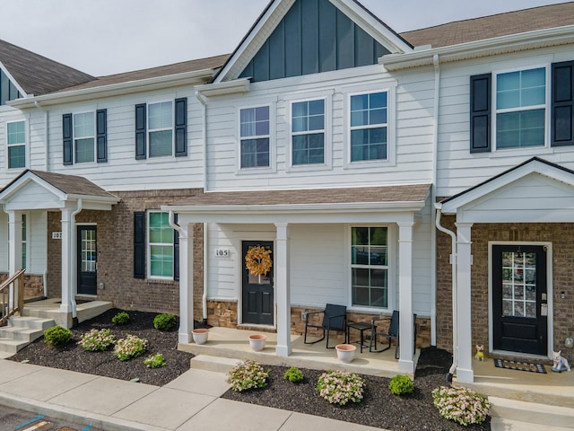 105 Grayson Cir, Chapel Hill, TN 37034 - view of property featuring covered porch, board and batten siding, and stone siding