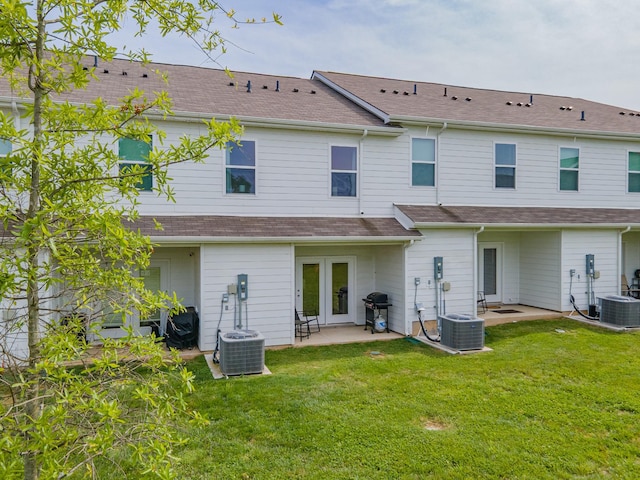 105 Grayson Cir, Chapel Hill, TN 37034 - back of property featuring a patio area, central air condition unit, and a lawn