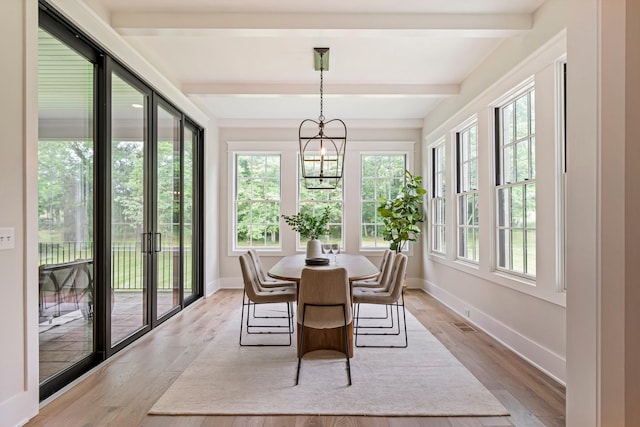 4617 Delta Springs Ln, Franklin, TN 37064 - sunroom featuring beamed ceiling, baseboards, wood finished floors, and a chandelier