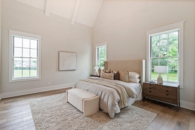 4617 Delta Springs Ln, Franklin, TN 37064 - bedroom with wood-type flooring, beamed ceiling, baseboards, and high vaulted ceiling