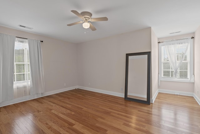 6769 Cold Stream Dr, Nashville, TN 37221 - unfurnished room featuring light wood-style flooring, a ceiling fan, and baseboards