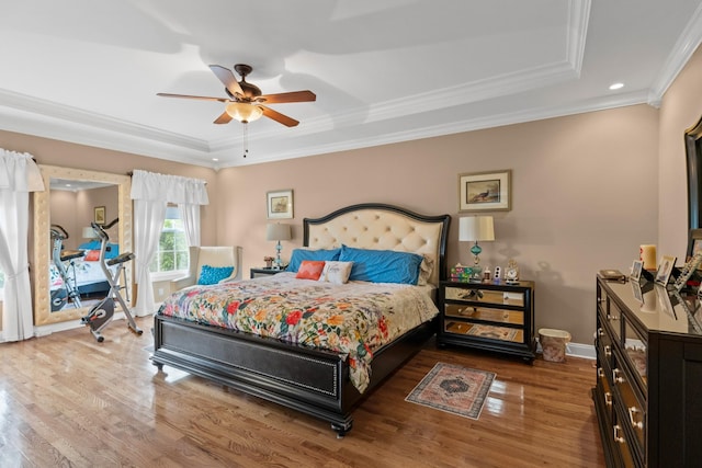 6769 Cold Stream Dr, Nashville, TN 37221 - bedroom featuring a raised ceiling, wood finished floors, ornamental molding, baseboards, and recessed lighting
