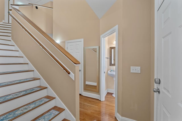 6769 Cold Stream Dr, Nashville, TN 37221 - stairs with wood finished floors and baseboards
