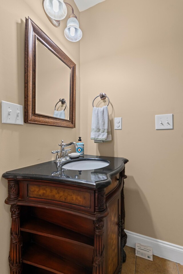 6769 Cold Stream Dr, Nashville, TN 37221 - bathroom featuring vanity, baseboards, and tile patterned flooring