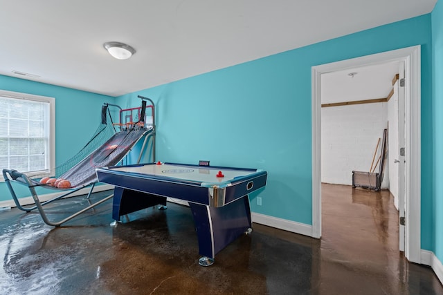 6769 Cold Stream Dr, Nashville, TN 37221 - game room with concrete floors and baseboards
