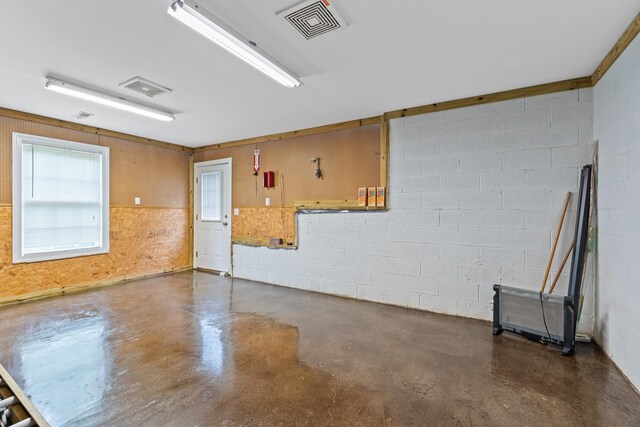 6769 Cold Stream Dr, Nashville, TN 37221 - unfurnished room featuring concrete floors and concrete block wall