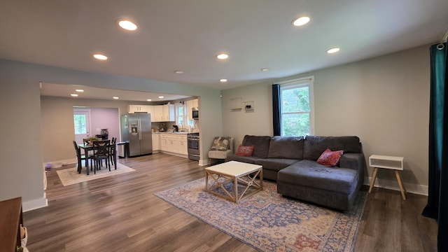 500 E 17th St, Columbia, TN 38401 - living area with healthy amount of natural light, dark wood-style floors, recessed lighting, and baseboards