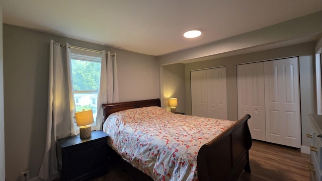 500 E 17th St, Columbia, TN 38401 - bedroom with multiple closets and dark wood-style flooring