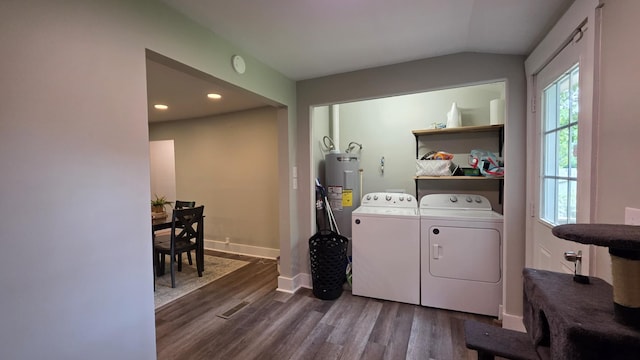 500 E 17th St, Columbia, TN 38401 - washroom with washer and clothes dryer, dark wood-style flooring, water heater, baseboards, and recessed lighting