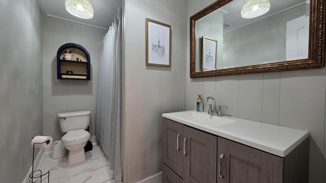 500 E 17th St, Columbia, TN 38401 - full bath with marble finish flooring, toilet, vanity, and baseboards