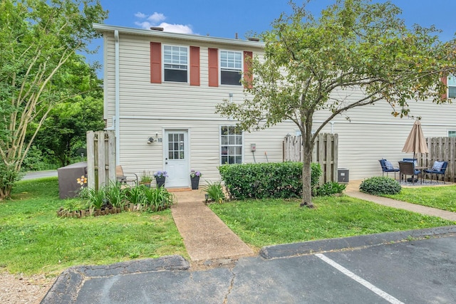 1301 Neelys Bend Rd Unit A10, Madison, TN 37115 - view of property with a patio area, cooling unit, and uncovered parking