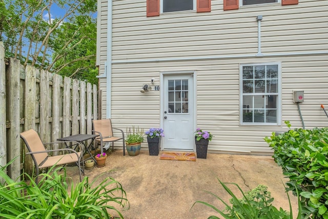 1301 Neelys Bend Rd Unit A10, Madison, TN 37115 - view of exterior entry featuring fence and a patio area