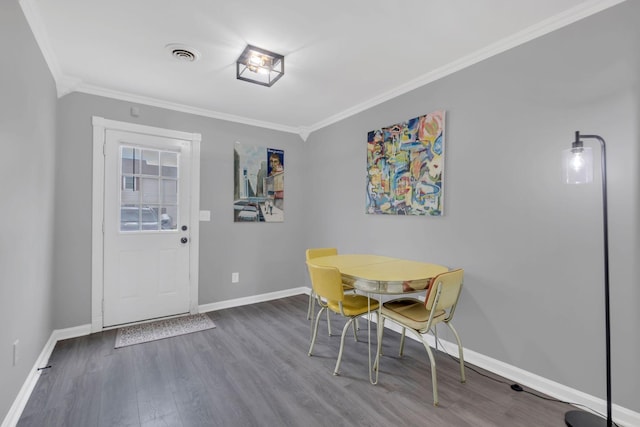 1301 Neelys Bend Rd Unit A10, Madison, TN 37115 - dining area with ornamental molding, wood finished floors, and baseboards