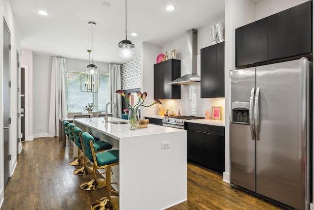 2910 Felicia St Unit 18, Nashville, TN 37209 - kitchen featuring stainless steel refrigerator with ice dispenser, wall chimney exhaust hood, dark cabinetry, light countertops, and recessed lighting