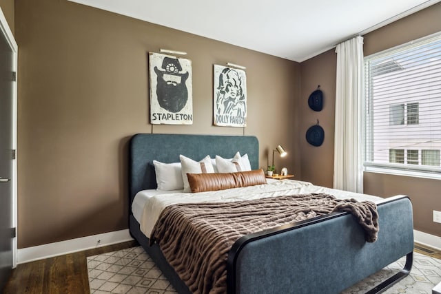 2910 Felicia St Unit 18, Nashville, TN 37209 - bedroom featuring baseboards, wood finished floors, and multiple windows