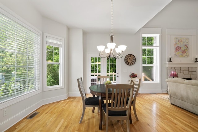 4019 Fremantle Cir, Spring Hill, TN 37174 - dining space featuring a chandelier, light wood-style floors, and baseboards