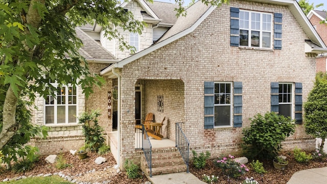 4019 Fremantle Cir, Spring Hill, TN 37174 - view of front facade featuring a shingled roof and brick siding