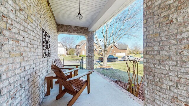 4019 Fremantle Cir, Spring Hill, TN 37174 - view of patio / terrace featuring a porch and a residential view