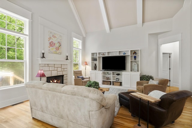 4019 Fremantle Cir, Spring Hill, TN 37174 - living room with a fireplace, light wood finished floors, beamed ceiling, high vaulted ceiling, and baseboards