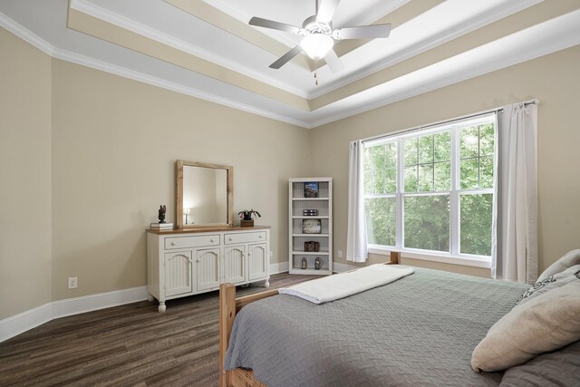 4019 Fremantle Cir, Spring Hill, TN 37174 - bedroom featuring a tray ceiling, crown molding, dark wood finished floors, baseboards, and ceiling fan