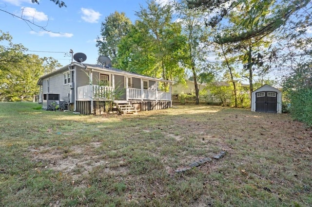 119 Wynns Ferry Rd, Dover, TN 37058 - view of yard with a storage shed, an outbuilding, and a wooden deck