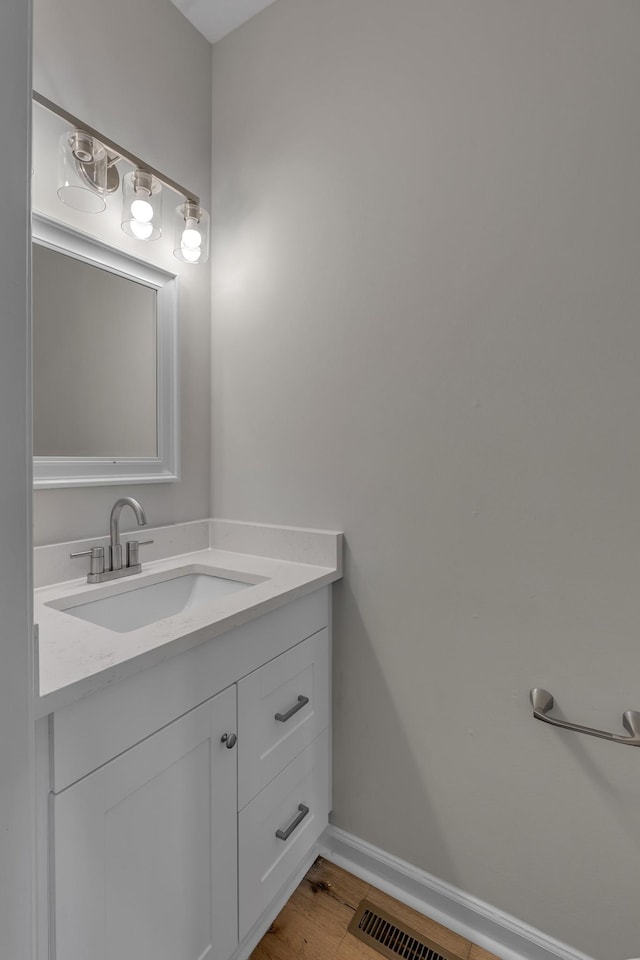 408 Jordan Leigh Ct, Joelton, TN 37080 - bathroom with vanity, baseboards, and wood finished floors