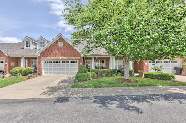 236 Danoher Walk, Murfreesboro, TN 37128 - view of front of house featuring brick siding, a garage, concrete driveway, a front lawn, and a shingled roof