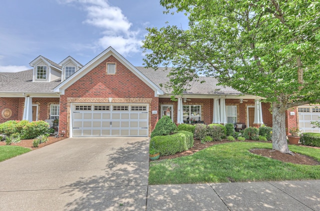 236 Danoher Walk, Murfreesboro, TN 37128 - view of front of house featuring concrete driveway, a garage, brick siding, and a front lawn