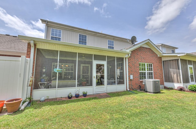 236 Danoher Walk, Murfreesboro, TN 37128 - back of property featuring a sunroom, central AC, brick siding, and a lawn
