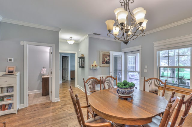 236 Danoher Walk, Murfreesboro, TN 37128 - dining area featuring light wood-style floors, ornamental molding, a chandelier, and baseboards