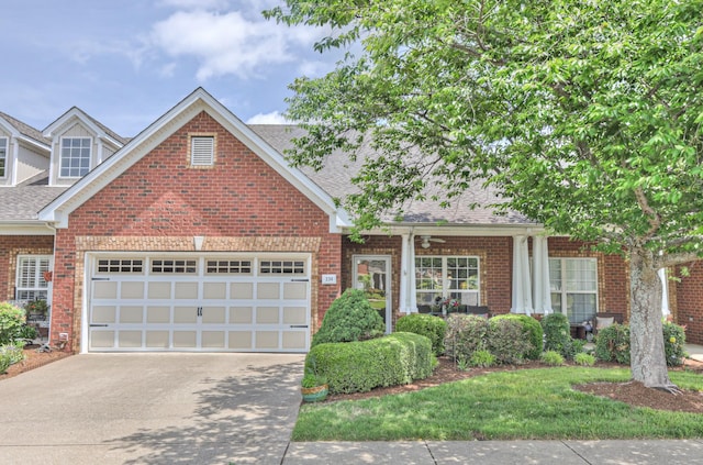 236 Danoher Walk, Murfreesboro, TN 37128 - view of front facade featuring driveway, roof with shingles, a garage, and brick siding
