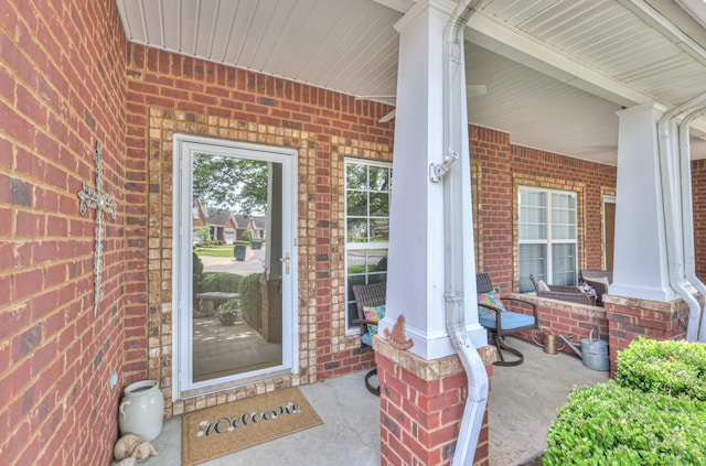 236 Danoher Walk, Murfreesboro, TN 37128 - view of exterior entry with a porch and brick siding