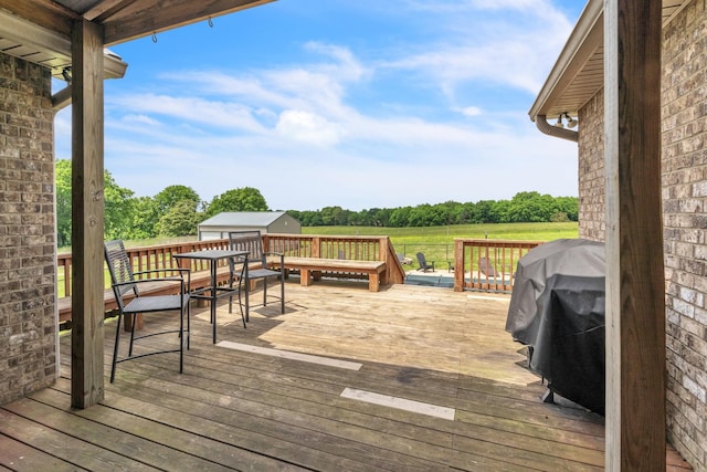 5440 Eugene Kennedy Ln, Cedar Hill, TN 37032 - wooden terrace featuring an outdoor structure and view of wooded area