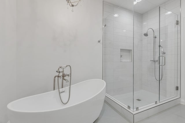 308 Stanley Park Ln, Franklin, TN 37069 - bathroom featuring a shower stall and a freestanding bath
