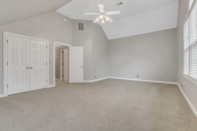 308 Stanley Park Ln, Franklin, TN 37069 - unfurnished bedroom with carpet floors, lofted ceiling, baseboards, a closet, and multiple windows