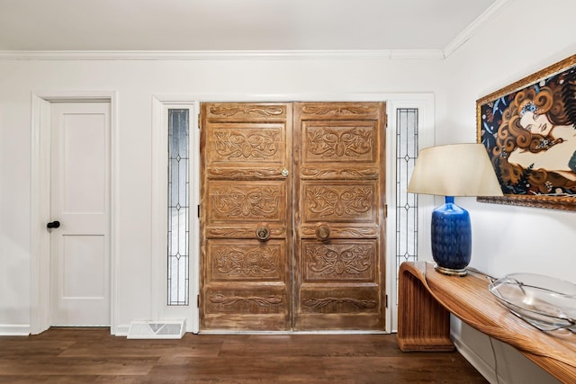 512 Westwood Dr, Tullahoma, TN 37388 - foyer with crown molding and dark wood-type flooring