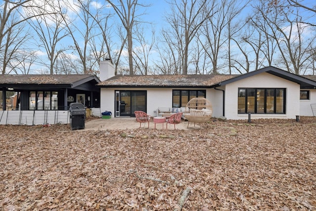 512 Westwood Dr, Tullahoma, TN 37388 - rear view of property with brick siding, a chimney, a patio area, and an outdoor living space