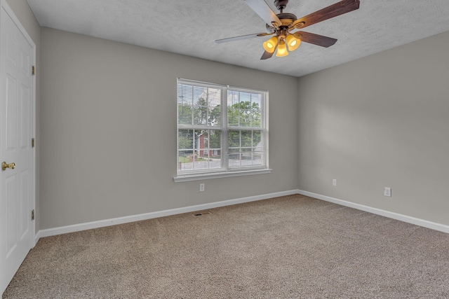 1514 Center Pointe Dr, Murfreesboro, TN 37130 - empty room featuring carpet floors, baseboards, ceiling fan, and a textured ceiling