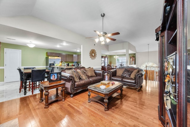 845 Nandina Ct, Clarksville, TN 37043 - living area featuring a ceiling fan, light wood-type flooring, and a chandelier