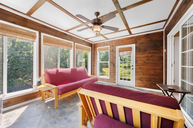 845 Nandina Ct, Clarksville, TN 37043 - sunroom / solarium with a ceiling fan, wooden walls, stone flooring, and outdoor lounge area