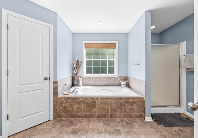 845 Nandina Ct, Clarksville, TN 37043 - bathroom with a garden tub and a stall shower