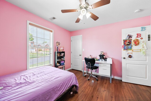 845 Nandina Ct, Clarksville, TN 37043 - bedroom with dark wood-type flooring, baseboards, a ceiling fan, and fridge