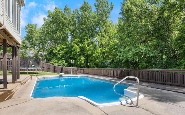 845 Nandina Ct, Clarksville, TN 37043 - view of pool with a trampoline, a patio area, and a fenced backyard