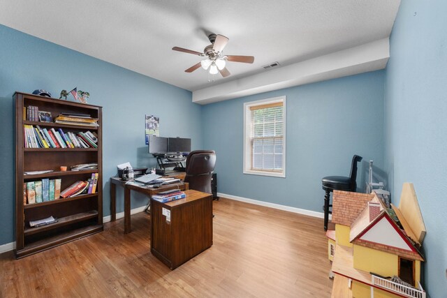 845 Nandina Ct, Clarksville, TN 37043 - office space featuring a ceiling fan, wood finished floors, and baseboards